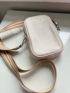 kate spade Pebbled Leather Crossbody in Soft Pink with Striped Strap